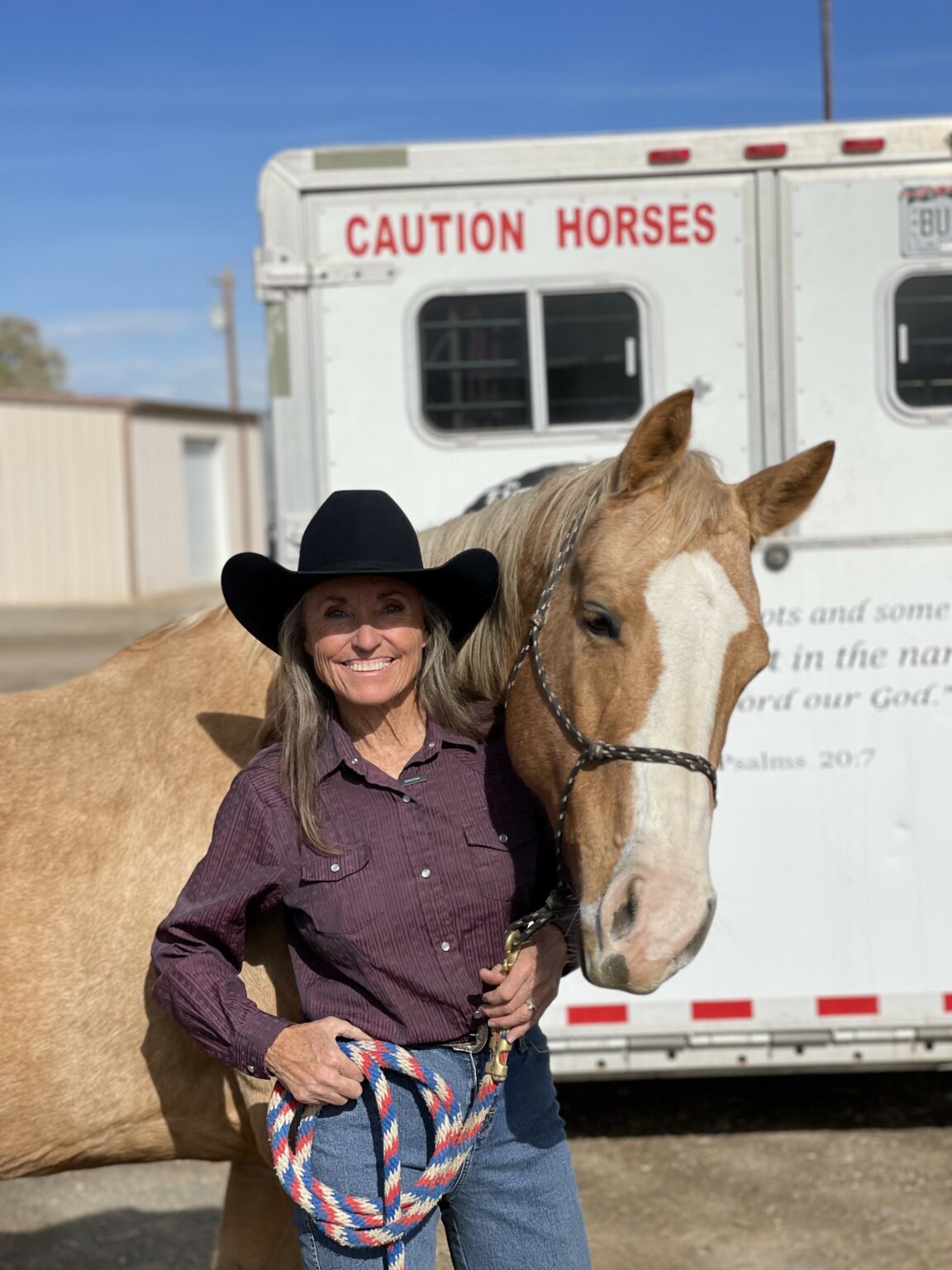 Connie V. Wyatt, owner and President of Assertive Holdings, LLC, with her barrel horse